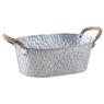 Oval metal basket with white spots