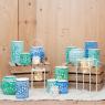 Patinated metal candle holders
