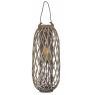 Grey willow and glass lantern