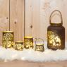 Patinated metal candle holder