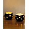 Lacquered metal candle holders