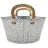 Round metal basket with white spots