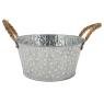 Round metal basket with white spots