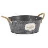 Patinated metal round basket