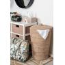 Whitewashed rattan laundry basket
