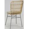 Patinated rattan and metal chair