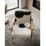 100% natural goat skin and teak armchair