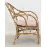 Armchair in coffee brown rattan