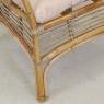 Armchair in coffee brown rattan