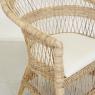 Armchair in teak and rattan