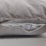 Cotton cushion with faded effect.