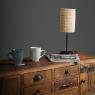 Natural rattan lamp with metal leg