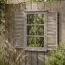 Fenêtre miroir en bois teinté
