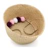 Natural rush bag with pompoms