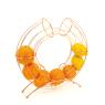 Copper-colored metal orange basket